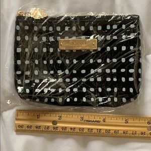 Black and white cosmetic bag, new in wrapping